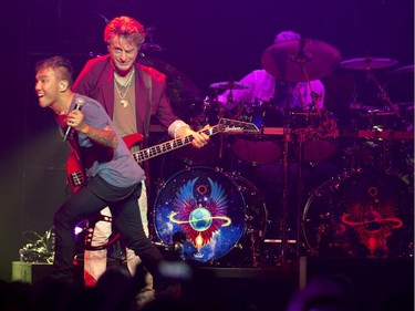 Arnel Pineda, left, and Ross Valory of Journey perform in concert at the Bell Centre in Montreal,  July 28, 2015.
