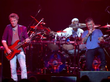 Ross Valory (L) and Arnel Pineda of Journey perform in concert at the Bell Centre in Montreal, July 28, 2015.