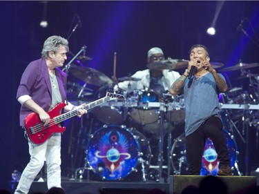 Ross Valory (L) and Arnel Pineda of Journey perform in concert at the Bell Centre in Montreal,  July 28, 2015.