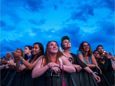 Music fans enjoy the performance by Of Monsters and Men on day one of the 2015 edition of the Osheaga Music Festival at Jean-Drapeau Park in Montreal on Friday, July 31, 2015.