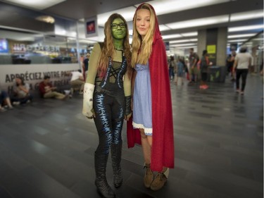 Laury Désilets, left, as Gamora from Guardians of the Galaxy, and Abigail Wood right, as a pretty Red Riding Hood at Montreal Comiccon July 4, 2015.