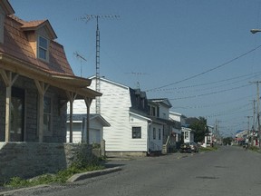 Homes along a street in Kahnawake, south of Montreal, on Sunday, July 5, 2015.