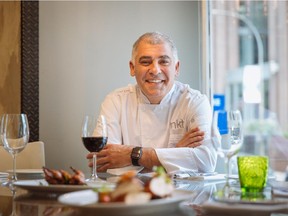 Chef Marino Tavares poses for a photo at his restaurant, MKT, in downtown Montreal on Thursday, July 9, 2015.