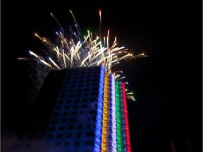 Fireworks go off the roof of  Canadian Olympic House on René Lévesque in Montreal, Thursday July 9, 2015.