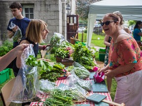 Sharon Leslie, right, shops for produce with help from volunteer Beverly Rudolph at the Good Food Market, which caters to everyone, including commuters on their way north from the Vendôme métro or and MUHC employees.