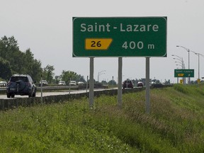 MONTREAL, QUE.: JUNE 28, 2014 -- St-Lazare is planning to re-design some of the town's entrances and exits here are the exit signs on highway 40  Saturday, June 28, 2014. (Peter McCabe / THE GAZETTE) ORG XMIT: 50341