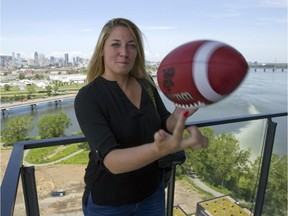 MONTREAL, QUE.: JUNE 30, 2015 -- Montreal freelance sports photographer Johany Jutras in Montreal, Tuesday June 30, 2015.  She's starting a book project to document the football and CFL culture each CFL city in photos, starting July 20th.  (Phil Carpenter / MONTREAL GAZETTE)