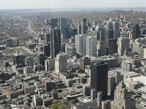 An aerial cityscape view of the skyline of downtown Montreal.