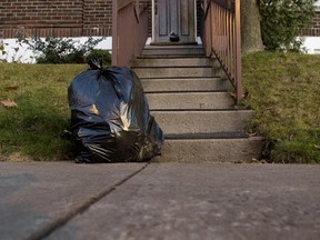 MONTREAL QUE: NOVEMBER 16 2009--Garbage sits on the street curb waiting for pickup in the NDG district of  Montreal Monday November 16th 2009. The city is considering new rules for garbage collection. (THE GAZETTE/Allen McInnis)