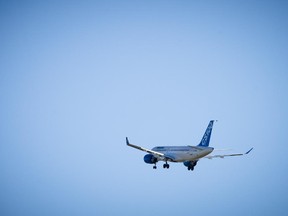 The Bombardier CSeries aircraft flight test vehicle one (FTV1) flies shortly after takeoff during its maiden flight at the Montreal-Mirabel International Airport in Mirabel, 50 kilometres north of Montreal in 2013.