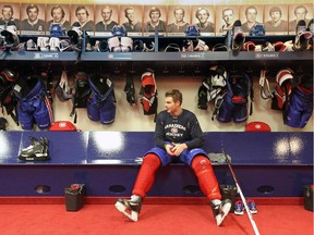 The Canadiens' Alex Galchenyuk sits at his locker following practice a the team's training facility in Brossard on Feb. 17, 2013.
