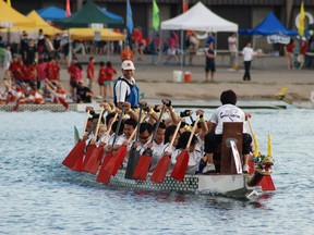 Patrick Scott, pictured standing, gives beginner dragon boat classes at the Pointe-Claire Canoe Club. Photo credit: Jean Chen. Entered by Kathryn Greenaway, July 30, 2015.