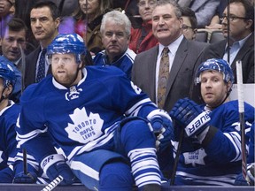 Toronto Maple Leafs new interim head coach Peter Horachek, centre, looks on as Maple Leafs' Phil Kessel, left, jumps on the ice against the Washington Capitals during first period NHL hockey action in Toronto on Wednesday, January 7, 2015. The Toronto Maple Leafs have traded star winger Phil Kessel to the Pittsburgh Penguins.