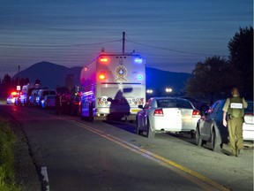 Police at the scene of a shooting in Marieville, about 45 kilometres east of Montreal, July 8, 2015. Two people are dead and another has suffered serious injuries.