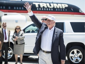 Republican Presidential candidate and business mogul Donald Trump exits his plane during his trip to the border on July 23, 2015, in Laredo, Texas.