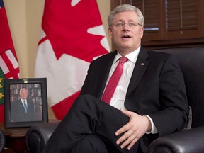 Canadian Prime Minister Stephen Harper speaks to the media in his office on Thursday June 26, 2014 in Ottawa. Canada's federal political parties are actively carving out their final plans for the Oct. 19 election campaign, which is expected to get underway this weekend.Sources familiar with the plans say Harper is expected to visit the Governor General on Sunday to ask that Parliament be dissolved.