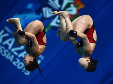 Canada's divers Maeghan Benfeito and Roseline Filion compete in the Women's 10m platform synchronised final diving event at the 2015 FINA World Championships in Kazan on July 27, 2015.