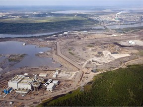 The Athabasca river runs through a Suncor oilsands facility near Fort McMurray.