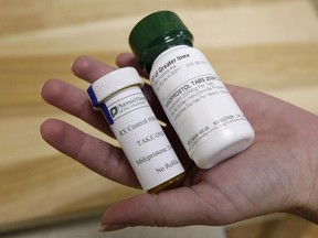 This Wednesday, Sept. 22, 2010 picture shows bottles of abortion-inducing drugs in Des Moines, Iowa.