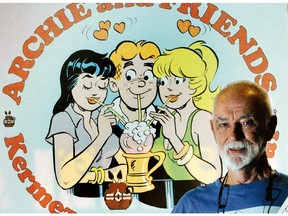 In this July 15, 2014 photo, Tom Moore, the "Archie" cartoonist, poses for a photo in El Paso, Texas. Moore, who brought to life the escapades of a freckled-face, red-haired character, has died Monday, July 20, 2015, in Texas. He was 86.