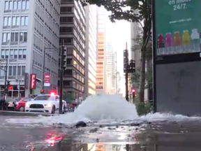 A water main break at the corner of University and Sherbrooke Sts. in downtown Montreal.