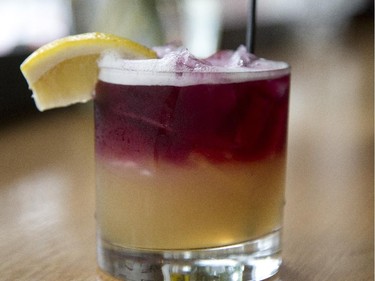 Winooski circle is made with rye, lemon, sugar and red  wine float, and is served at Mule Bar in Winooski, Vermont, Saturday June 27, 2015.