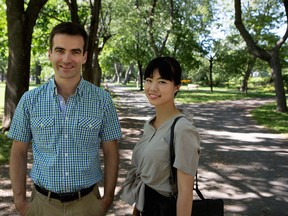 Matthew Dubé, left, NDP incumbent in the Beloeil-Chambly riding, and Laurin Liu, NDP incumbent in the Rivière-des-Mille-Îles riding, are seen in Parc La Fontaine in Montreal on Thursday, Aug.t 20, 2015.