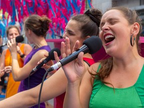 As part of The Public Pianos of Montreal in Tune event, the all-girl group VoxA4 paid tribute to French singer Edith Piaf on Victoria St. in Montreal, on Thursday, August 20, 2015y. Left to right, Élodie Miron, Luce Bélanger, Anne-Marie Pilon, Marie-Eve Villemure during their lunch-hour performance.