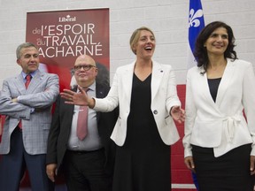 Grace Batchoun (r), put a smile on her loss after being defeated for the Liberal party candidacy in Ahuntsic-Cartierville by Mélanie Joly (second from right) on Sunday. But citing several factors including numbers on a voting list she contends don't add up, Batchoun announced yesterday she is appealing the result of the vote.