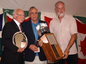Montreal Gazette sportswriter Ian MacDonald (centre) accepts the 2009 Canadian Baseball Hall of Fame's Jack Graney Award from former Expos GM and manager Jim Fanning (left), who was inducted into the shrine in 2000, and Toronto Star baseball writer Richard Griffin, who spent more than 20 years in the Expos media-relations department and would win the Graney Award in 2014.
