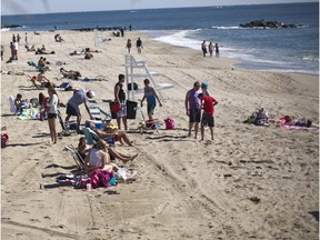 People sunbathe on a New Jersey beach.