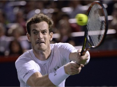 Andy Murray, of Great Britain, returns to Kei Nishikori, of Japan, during the semi-finals at the Rogers Cup tennis tournament on Saturday, August 15, 2015, in Montreal.