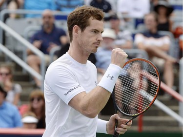 Andy Murray, of Great Britain, celebrates a point against Gilles Muller, of Luxembourg, during round of 16 tennis action at the Rogers Cup in Montreal on Thursday, August 13, 2015.