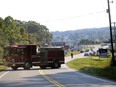 Authorities block Virginia State Route 122 at Bridgewater Plaza, Wednesday, Aug. 26, 2015, in Moneta, Va., after two journalists were fatally shot while broadcasting live from the plaza earlier in the day. (Stephanie Klein-Davis/The Roanoke Times via AP)