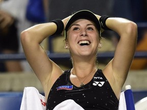 Belinda Bencic of Switzerland smiles after defeating Serena Williams of the United States during Rogers Cup semi-final tennis action in Toronto on Saturday, August 15, 2015.