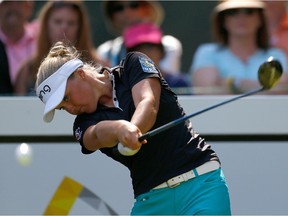 Brooke Henderson of Canada tees off on the 15th hole during the final round of the LPGA Cambia Portland Classic at Columbia Edgewater Country Club on August 16, 2015 in Portland, Ore.