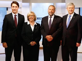 Canada's Liberal leader Justin Trudeau (L), Green Party leader Elizabeth May (2nd L), New Democratic Party (NDP) leader Thomas Mulcair (2nd R) and Conservative Prime Minister Stephen Harper (R)  at during the Maclean's National Leaders debate in Toronto, August 6, 2015.