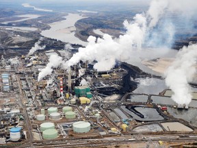 The aerial view shows the Suncor oilsands extraction facility near Fort McMurray, Alta.