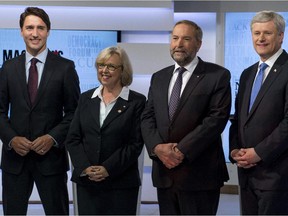 Party leaders Justin Trudeau, Liberal Party; Elizabeth May, Green Party; Thomas Mulcair, NDP; and Stephen Harper, Conservative Party, prior to the first  leaders' debate August 6, 2015 in Toronto.