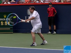 Mayor Denis Coderre needed all the help he could get to return a serve from Canadian tennis star Milos Raonic at Uniprix Tennis Stadium in Montreal, on Friday, August 7, 2015.