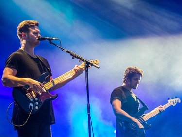 Joe Newman, left, of the band Alt-J performs on the third day of the 2015 edition of the Osheaga music festival at Parc Jean-Drapeau in Montreal on Sunday, August 2, 2015.
