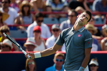 Novak Djokovic of Serbia reacts after losing a point against Andy Murray of Great Britain during the men's final for the Rogers Cup Tennis Tournament at Uniprix Stadium in Montreal on Sunday, August 16, 2015.