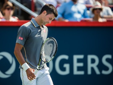 Novak Djokovic of Serbia reacts after losing a point against Andy Murray of Great Britain during the men's final for the Rogers Cup Tennis Tournament at Uniprix Stadium in Montreal on Sunday, August 16, 2015.
