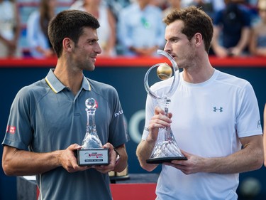 Second place winner Novak Djokovic of Serbia, left, poses for photograph with tournament winner Andy Murray of Great Britain after the men's final for the Rogers Cup Tennis Tournament at Uniprix Stadium in Montreal on Sunday, August 16, 2015.