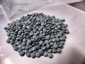 Fentanyl pills are shown in an undated police handout photo.