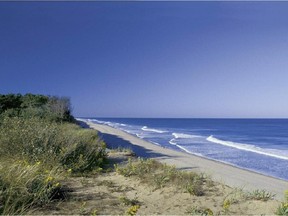This file photo provided by the Cape Cod Chamber of Commerce shows Coast Guard Beach in Cape Cod.