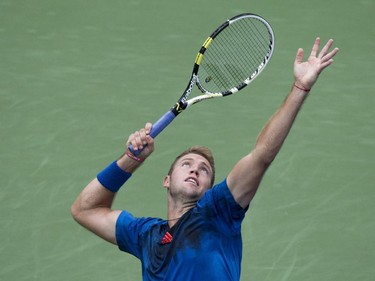 Jack Sock, of the United States, serves to Novak Djokovic, of Serbia, during round of sixteen play at the Rogers Cup tennis tournament Thursday August 13, 2015 in Montreal.