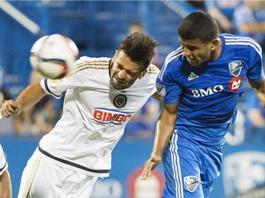 Montreal Impact's Johan Venegas, right, challenges Philadelphia Union's Richard Marquez during first half MLS soccer action in Montreal, Saturday, August 22, 2015.