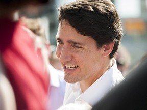 Liberal Leader Justin Trudeau greets the public during a campaign visit to the Regina Farmers' Market in Regina Aug. 12, 2015.