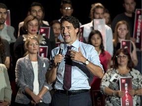Liberal leader Justin Trudeau addresses supporters at a rally Friday, August 28, 2015 in Montreal.